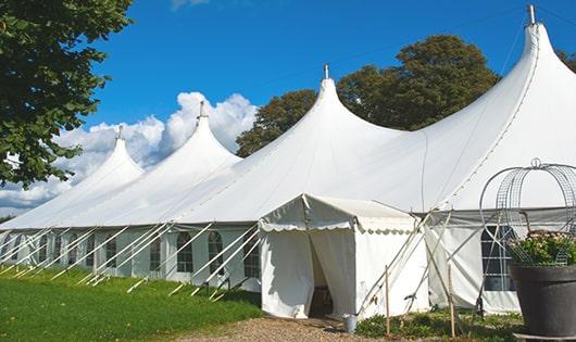 a line of sleek and modern porta potties ready for use at an upscale corporate event in Indian Orchard MA